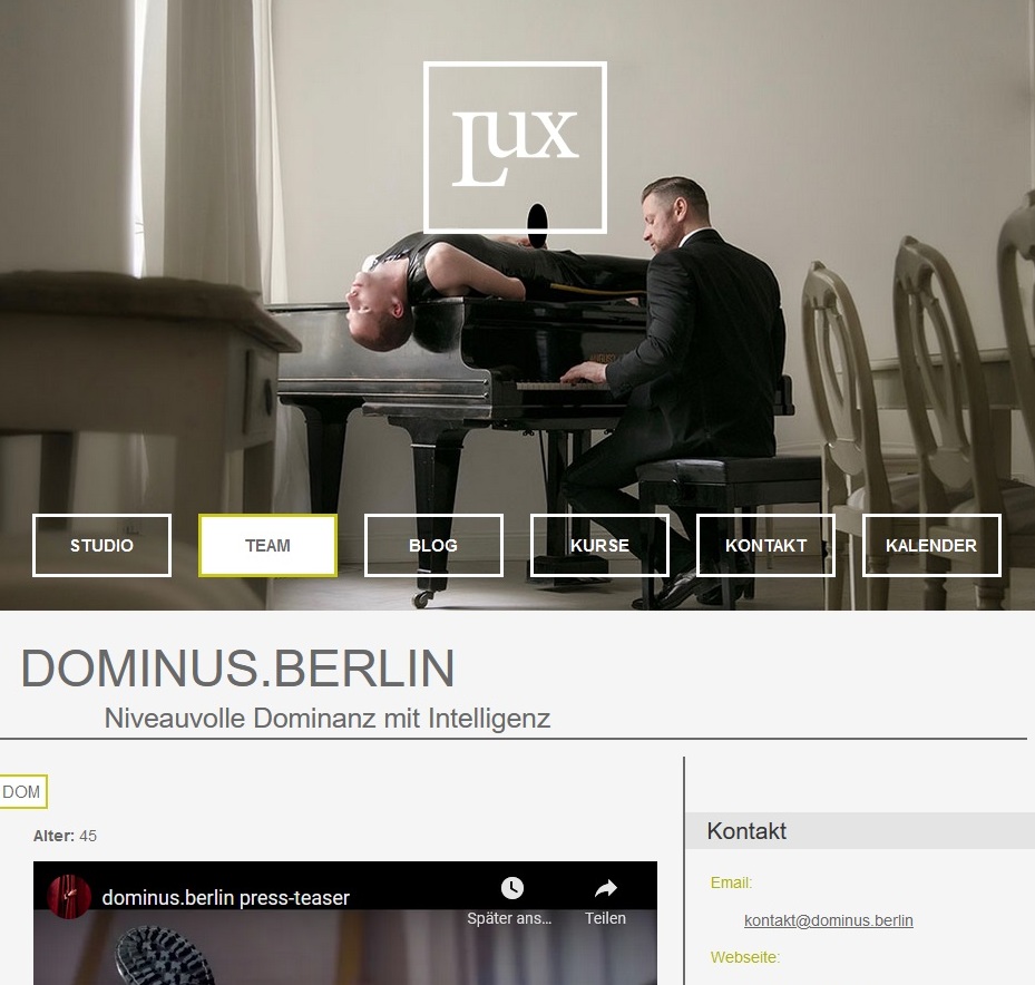 TEAM Dominus Berlin Startbildschirm Klavier Sklave Anzug Rubber
